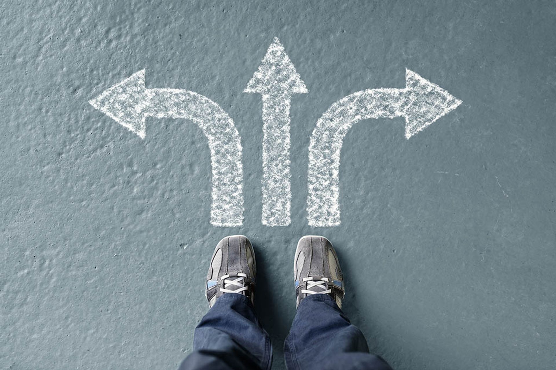 Image of a person choosing which direction to proceed in