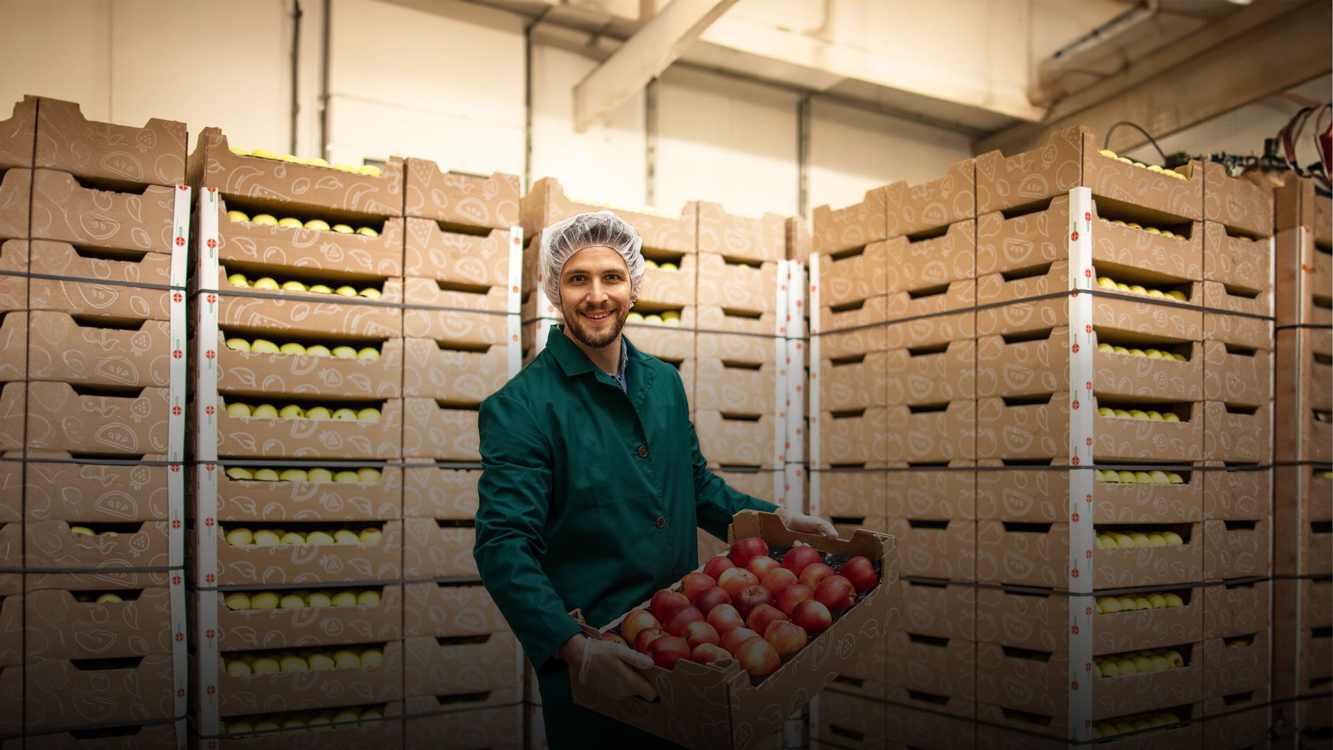 Image of a fruit trader handling fresh produce