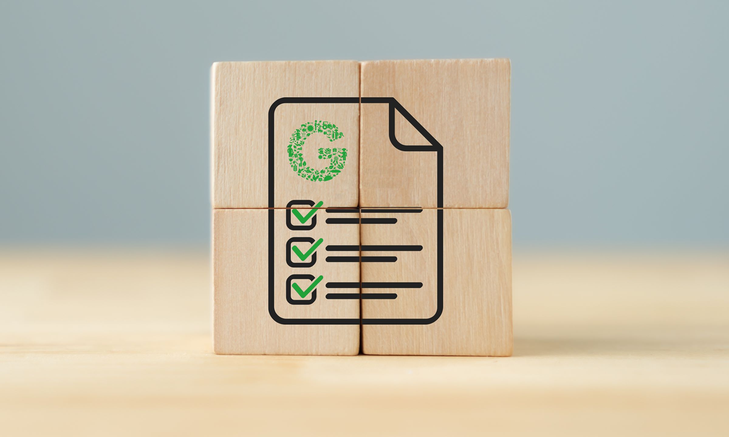 Zoomed image of wooden blocks assembled to create a certificate icon
